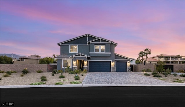 5449 Hickory Tree St, Las Vegas, NV 89149 - view of front facade with stucco siding, fence, an attached garage, and decorative driveway