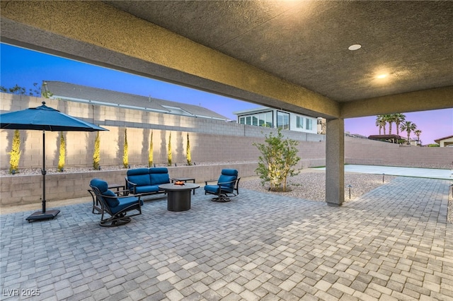 5449 Hickory Tree St, Las Vegas, NV 89149 - view of patio / terrace with a fenced backyard and an outdoor living space