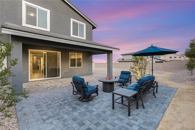 5449 Hickory Tree St, Las Vegas, NV 89149 - view of patio featuring a fire pit and a fenced backyard