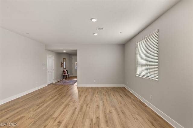 5449 Hickory Tree St, Las Vegas, NV 89149 - spare room with light wood-style floors, baseboards, and recessed lighting