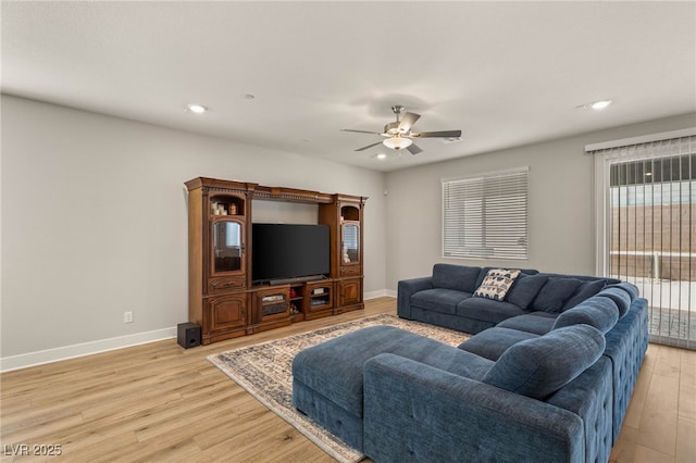 5449 Hickory Tree St, Las Vegas, NV 89149 - living area with light wood-type flooring, a ceiling fan, baseboards, and recessed lighting
