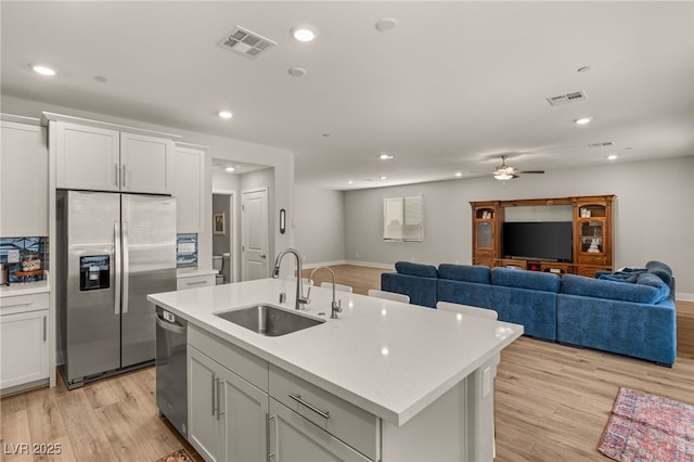 5449 Hickory Tree St, Las Vegas, NV 89149 - kitchen featuring appliances with stainless steel finishes, a sink, recessed lighting, light countertops, and ceiling fan