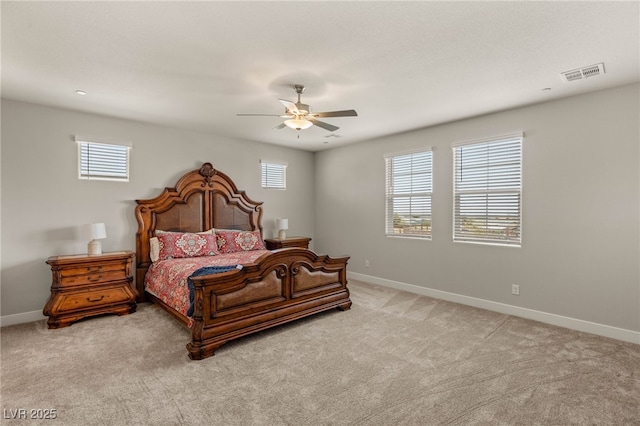 5449 Hickory Tree St, Las Vegas, NV 89149 - bedroom with baseboards, light colored carpet, and ceiling fan