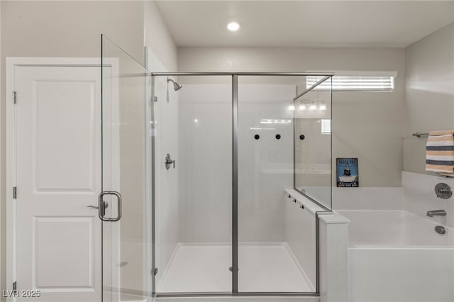 5449 Hickory Tree St, Las Vegas, NV 89149 - bathroom with a stall shower and a garden tub