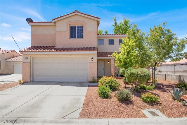 view of front of property with stucco siding, driveway, fence, a tiled roof, and an attached garage