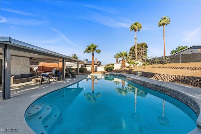 view of pool with a fenced backyard and a patio area