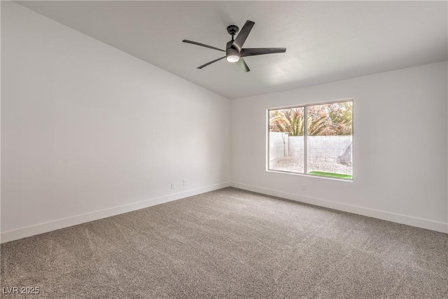 empty room with baseboards, carpet flooring, and a ceiling fan