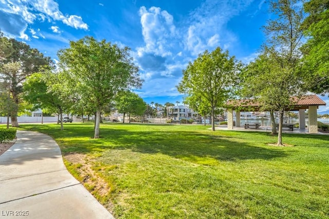 view of home's community with a gazebo and a lawn