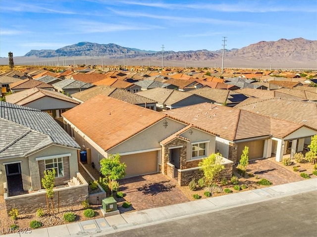 aerial perspective of suburban area with a mountain backdrop
