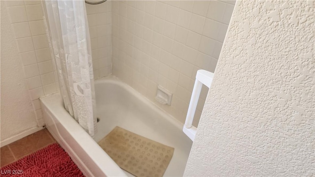 4285 El Como Way, Las Vegas, NV 89121 - bathroom with shower / tub combo with curtain and tile patterned flooring