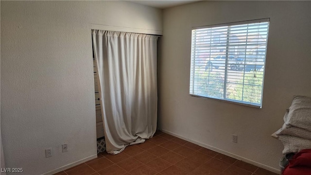 4285 El Como Way, Las Vegas, NV 89121 - tiled empty room with baseboards