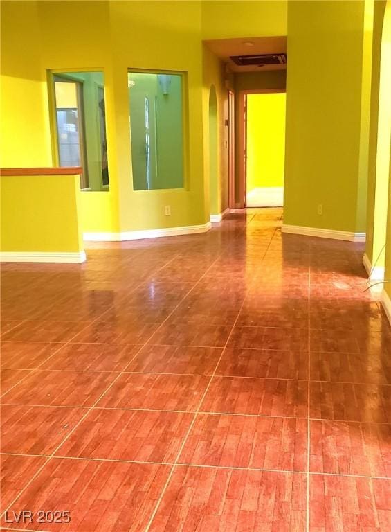3954 Saddlewood Ct, Las Vegas, NV 89121 - empty room with arched walkways and baseboards