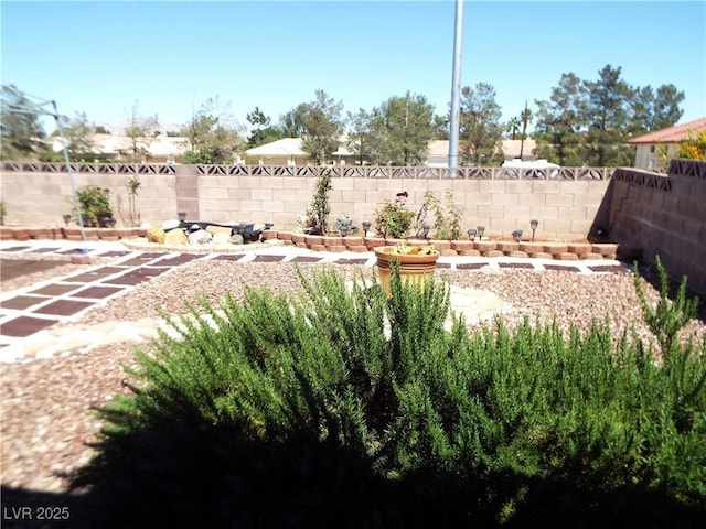 3954 Saddlewood Ct, Las Vegas, NV 89121 - fenced backyard with a patio area