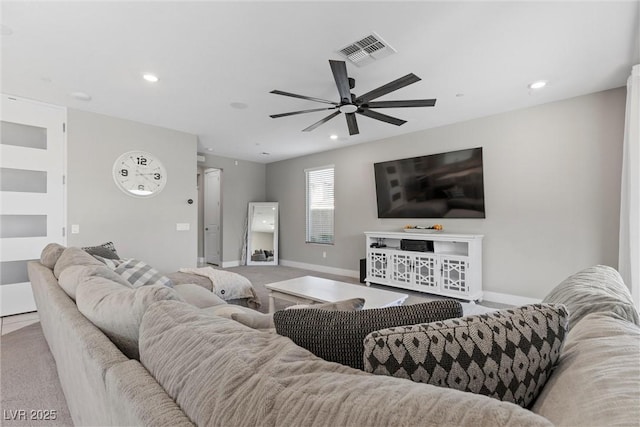 carpeted living room with a ceiling fan, recessed lighting, and baseboards