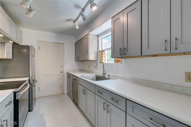 1127 Melville Dr, Las Vegas, NV 89102 - kitchen with a sink, range with electric cooktop, and gray cabinetry