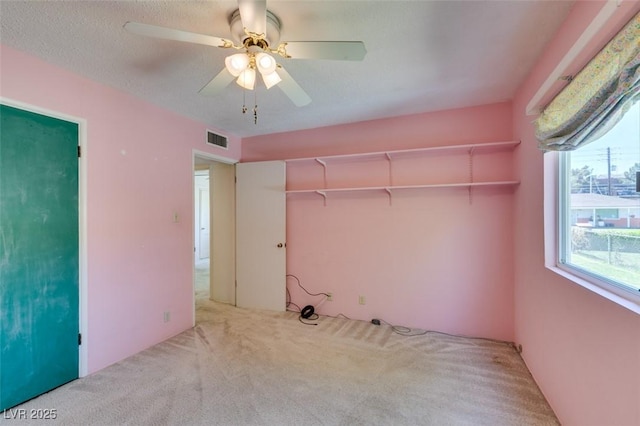 1127 Melville Dr, Las Vegas, NV 89102 - unfurnished bedroom with carpet and ceiling fan