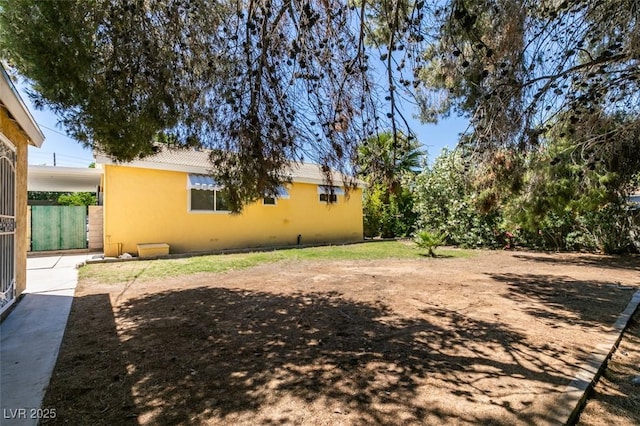 1127 Melville Dr, Las Vegas, NV 89102 - view of yard with an attached carport