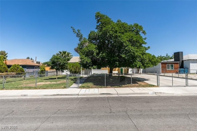 1127 Melville Dr, Las Vegas, NV 89102 - obstructed view of property with a gate