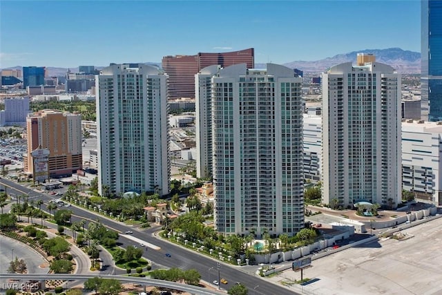 view of urban area with a mountain backdrop