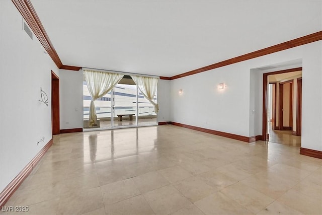 unfurnished room featuring ornamental molding, baseboards, and light tile patterned flooring