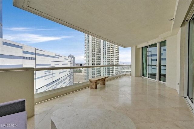 balcony featuring a city view