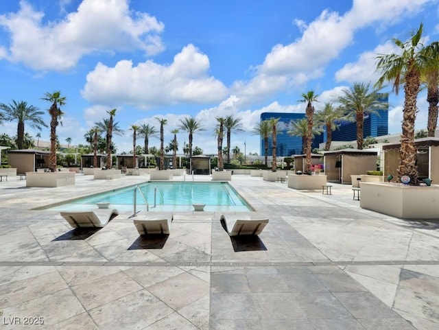 swimming pool featuring a patio