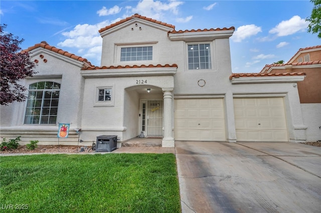 2124 Rising Mist St, Las Vegas, NV 89134 - mediterranean / spanish-style home with a tiled roof, concrete driveway, stucco siding, and a front lawn