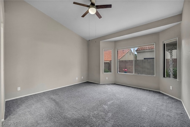 2124 Rising Mist St, Las Vegas, NV 89134 - spare room with ceiling fan, carpet floors, vaulted ceiling, and baseboards