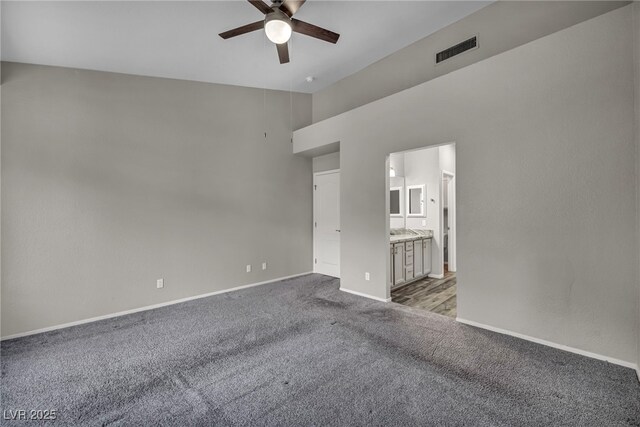 2124 Rising Mist St, Las Vegas, NV 89134 - empty room with ceiling fan, carpet, and high vaulted ceiling