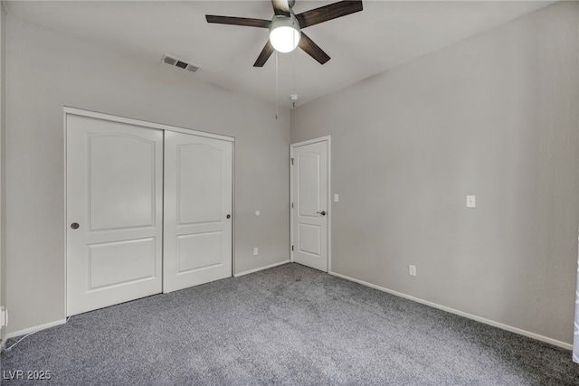 2124 Rising Mist St, Las Vegas, NV 89134 - unfurnished bedroom with carpet flooring, a closet, baseboards, and ceiling fan