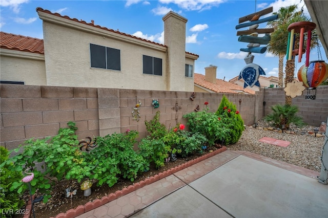 2124 Rising Mist St, Las Vegas, NV 89134 - fenced backyard with a patio area
