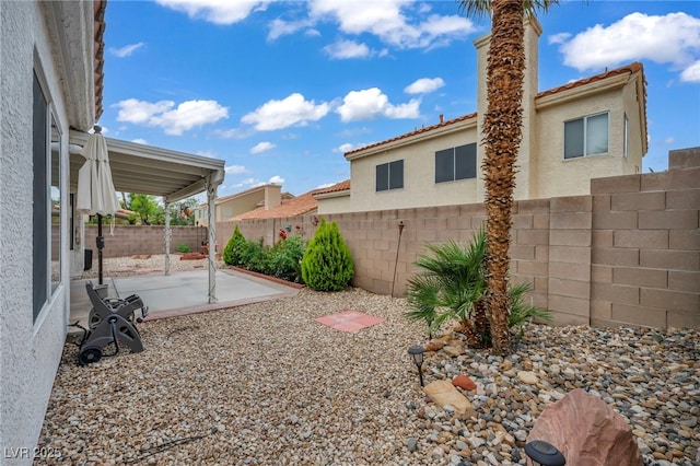 2124 Rising Mist St, Las Vegas, NV 89134 - fenced backyard featuring a patio
