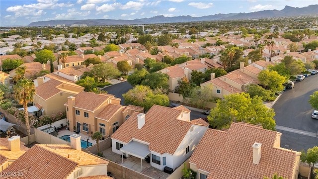 2124 Rising Mist St, Las Vegas, NV 89134 - aerial perspective of suburban area with a mountainous background