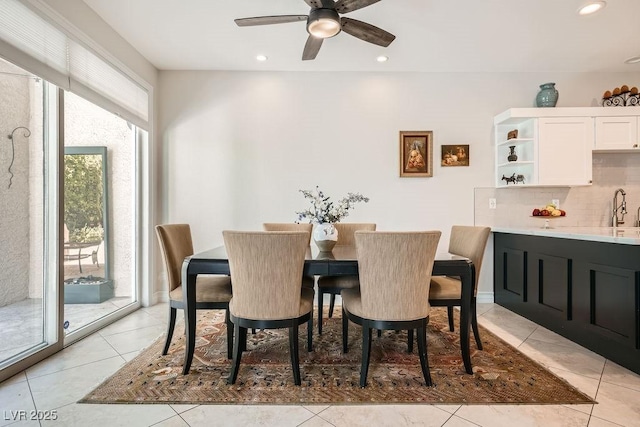 dining room featuring ceiling fan, recessed lighting, and light tile patterned floors