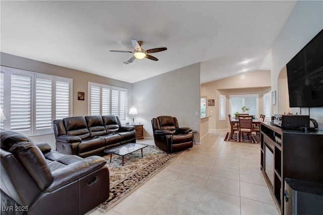 3712 Rocklin Peak Ave, North Las Vegas, NV 89081 - living room with a ceiling fan, light tile patterned floors, and lofted ceiling
