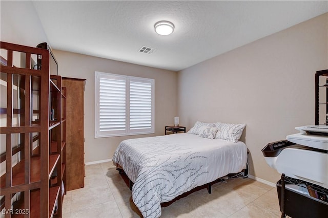 3712 Rocklin Peak Ave, North Las Vegas, NV 89081 - bedroom with light tile patterned floors and baseboards