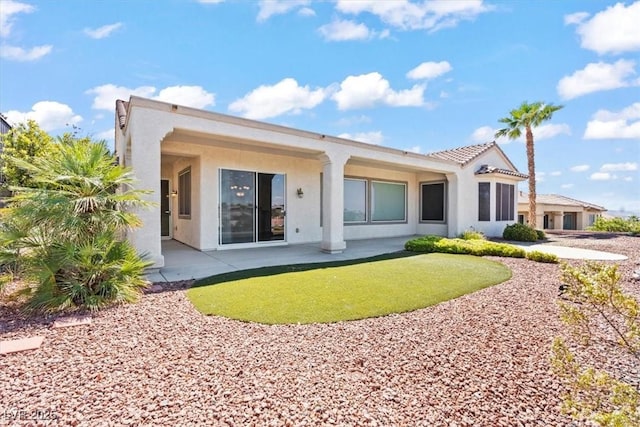 2868 Foxtail Creek Ave, Henderson, NV 89052 - back of house featuring stucco siding and a patio area