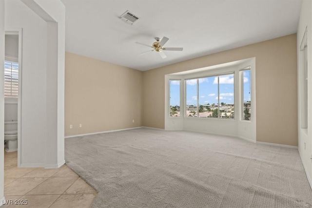 2868 Foxtail Creek Ave, Henderson, NV 89052 - carpeted spare room featuring ceiling fan, baseboards, and tile patterned floors