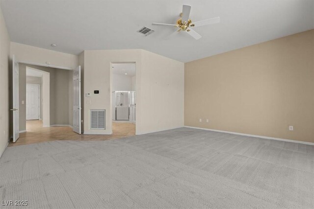 2868 Foxtail Creek Ave, Henderson, NV 89052 - spare room featuring light colored carpet, a ceiling fan, and baseboards
