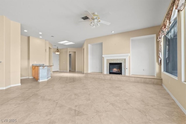 2868 Foxtail Creek Ave, Henderson, NV 89052 - unfurnished living room featuring a fireplace, ceiling fan, baseboards, and recessed lighting