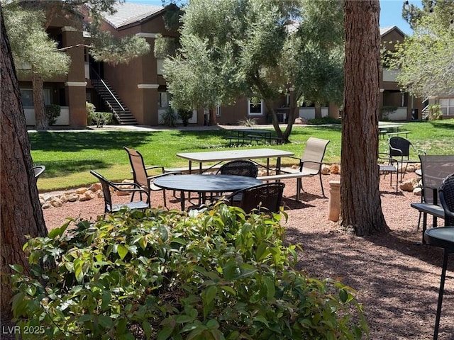 555 E Silverado Ranch Blvd Unit 2052, Las Vegas, NV 89183 - view of home's community featuring a yard