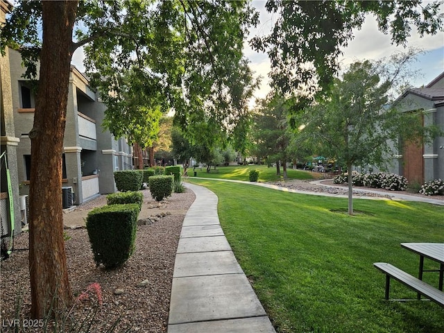 555 E Silverado Ranch Blvd Unit 2052, Las Vegas, NV 89183 - view of home's community featuring a yard