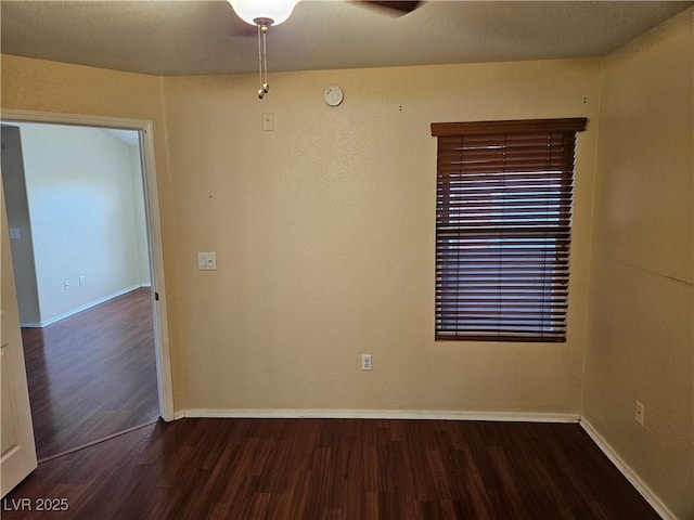 555 E Silverado Ranch Blvd Unit 2052, Las Vegas, NV 89183 - spare room with wood finished floors and baseboards