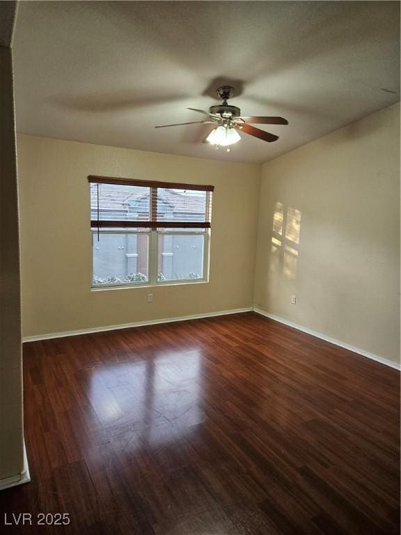 555 E Silverado Ranch Blvd Unit 2052, Las Vegas, NV 89183 - unfurnished room with plenty of natural light, wood finished floors, and baseboards