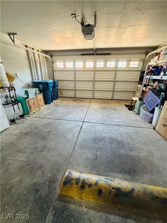 garage featuring a garage door opener