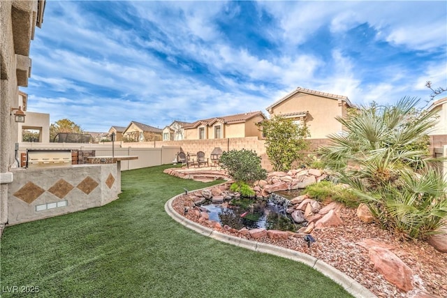 1324 Spice Ridge Ct, Henderson, NV 89012 - view of yard featuring area for grilling, a small pond, and a patio area