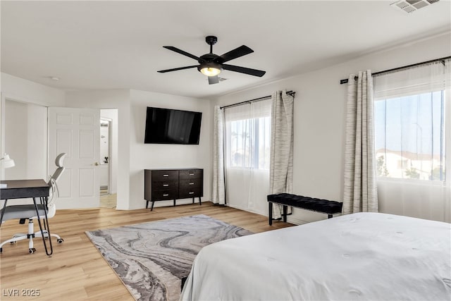 bedroom with wood finished floors and ceiling fan
