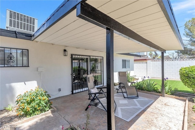 view of patio with fence