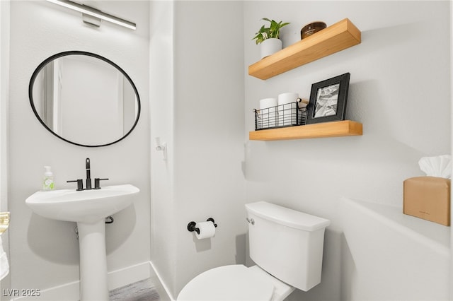 5684 Benevento Ct, Las Vegas, NV 89141 - bathroom featuring toilet and baseboards