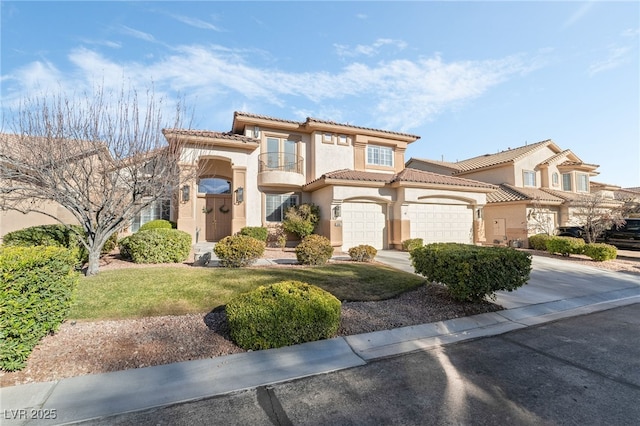 5684 Benevento Ct, Las Vegas, NV 89141 - mediterranean / spanish-style house featuring stucco siding, driveway, a balcony, a tiled roof, and a garage